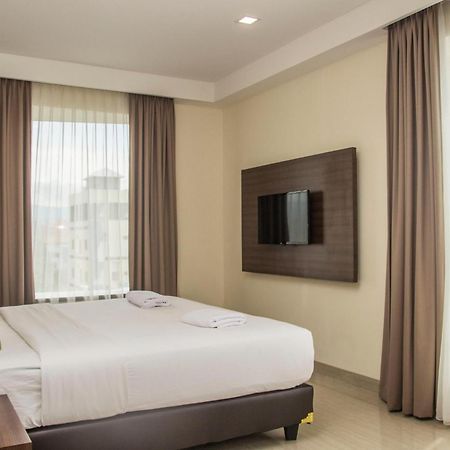 Green Eden Hotel Manado Habitación foto