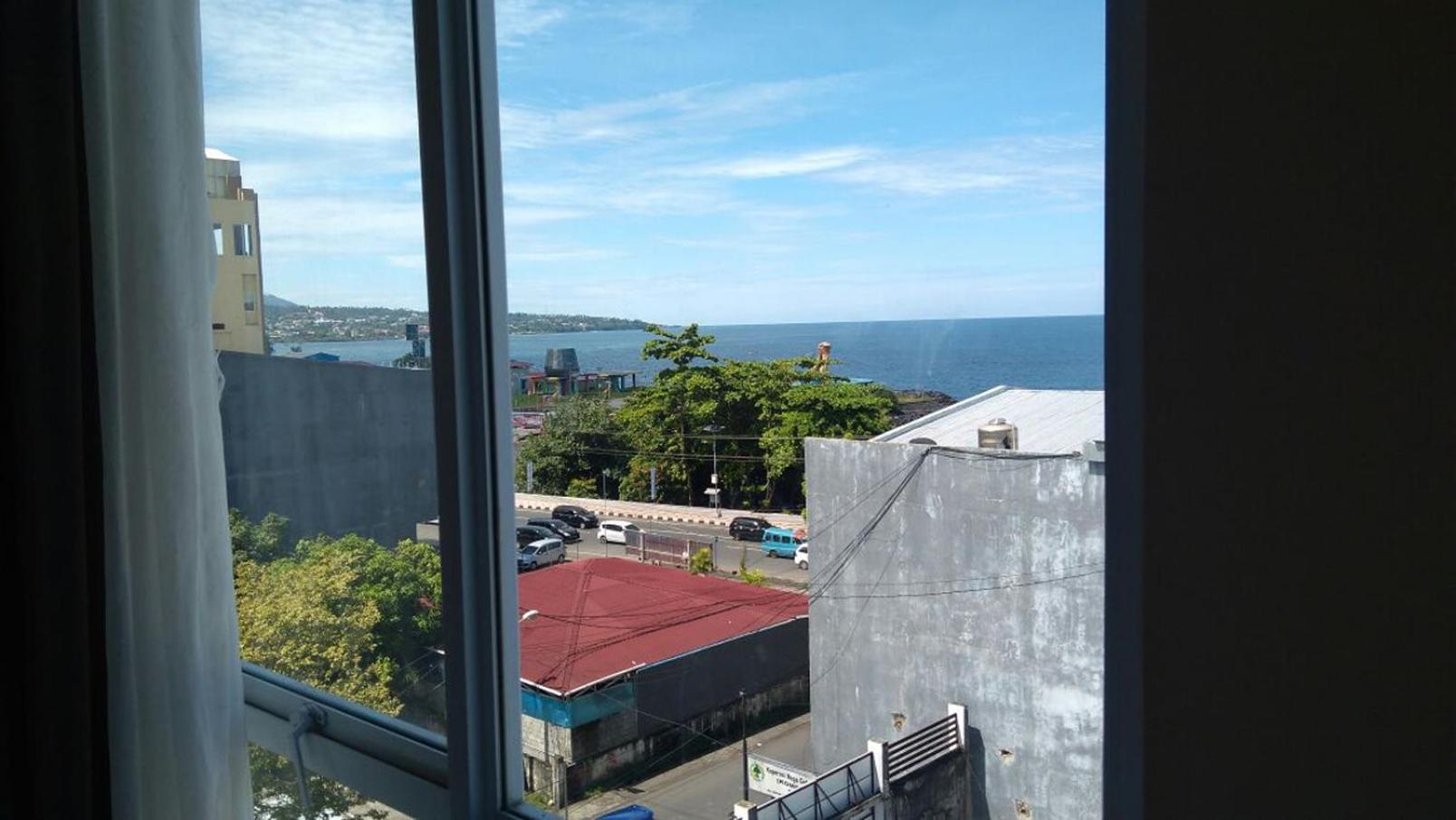 Green Eden Hotel Manado Habitación foto