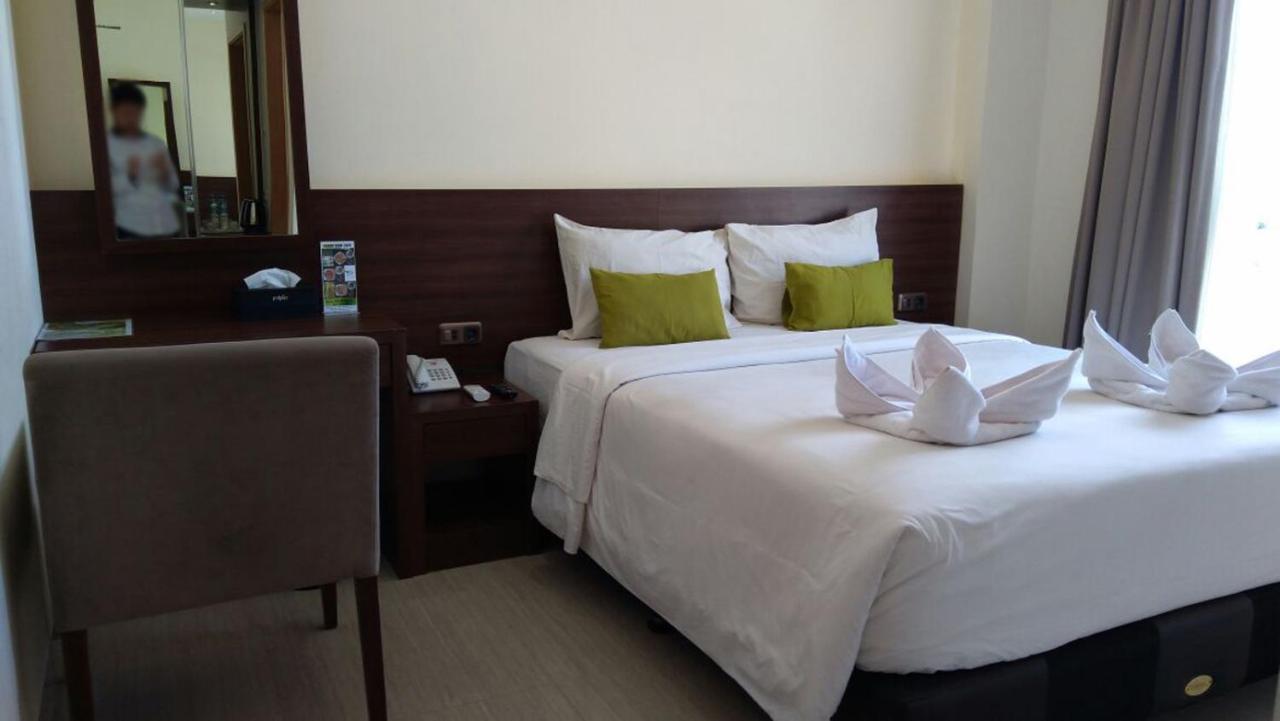 Green Eden Hotel Manado Habitación foto